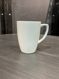 Plain white ceramic coffee mug